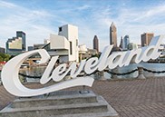 Cleveland sign in front of skyline