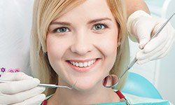 Smiling woman in dental chair