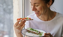 a man serving salad at dinner