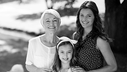 Mother daughter and grandmother smiling together