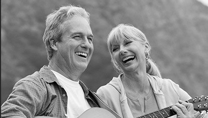 Laughing older man and woman