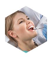 Woman  receiving dental exam